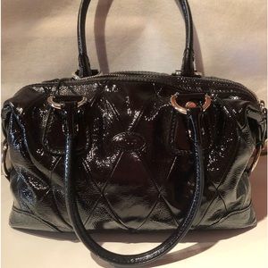 Gorgeous Tod’s quilted black patent leather handbag